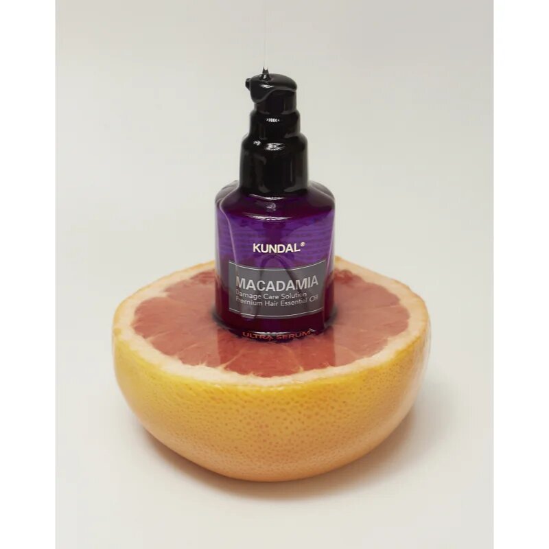 KUNDAL Macadamia Ultra Serum Pink Grapefruit regeneracijski oljni serum za poškodovane lase 100 ml
