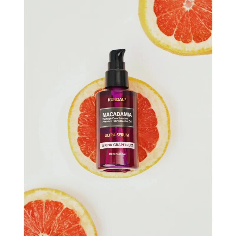 KUNDAL Macadamia Ultra Serum Pink Grapefruit regeneracijski oljni serum za poškodovane lase 100 ml