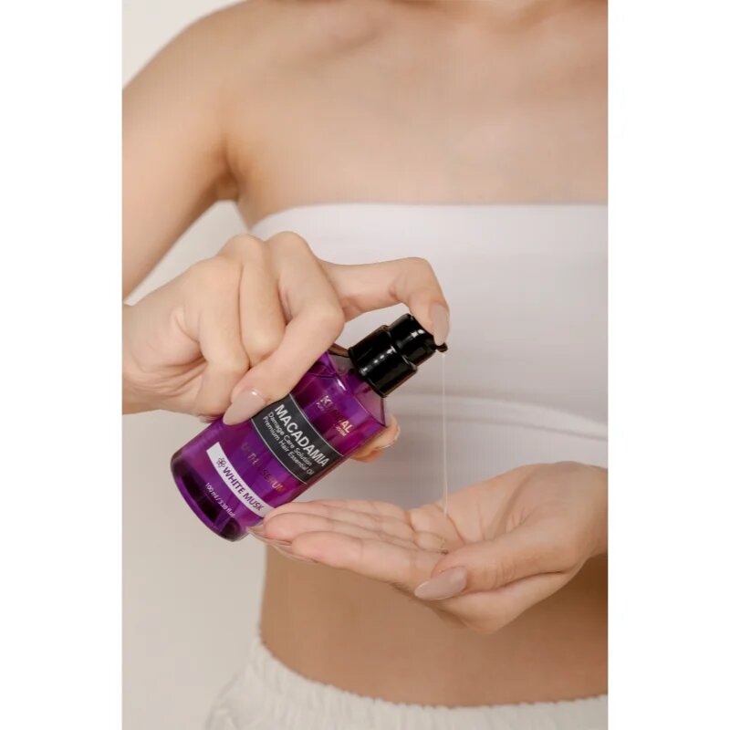 KUNDAL Macadamia Ultra Serum White Musk regeneracijski oljni serum za poškodovane lase 100 ml