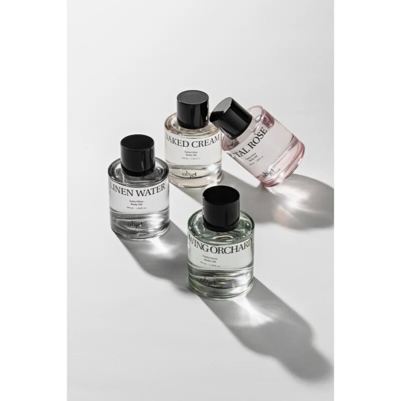 KUNDAL Objet Satin Glow Body Oil negovalno olje za telo za intenzivno vlažnost z vonjem Linen Water 100 ml
