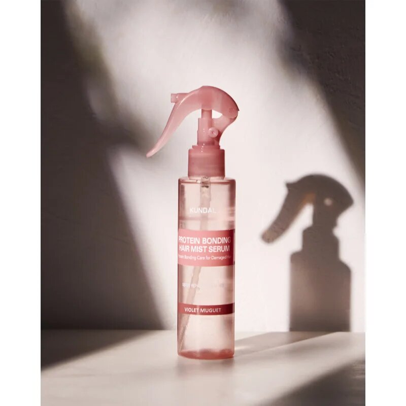 KUNDAL Protein Bonding Care Hair Mist Serum krepilni in regeneracijski serum za lase za suhe in poškodovane lase z vonjem Violet Muguet 150 ml