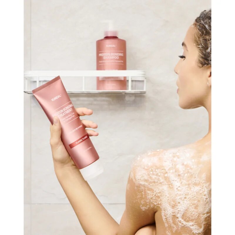 KUNDAL Protein Bonding Care Treatment kompleksna nega za suhe in poškodovane lase z vonjem Violet Muguet 250 ml