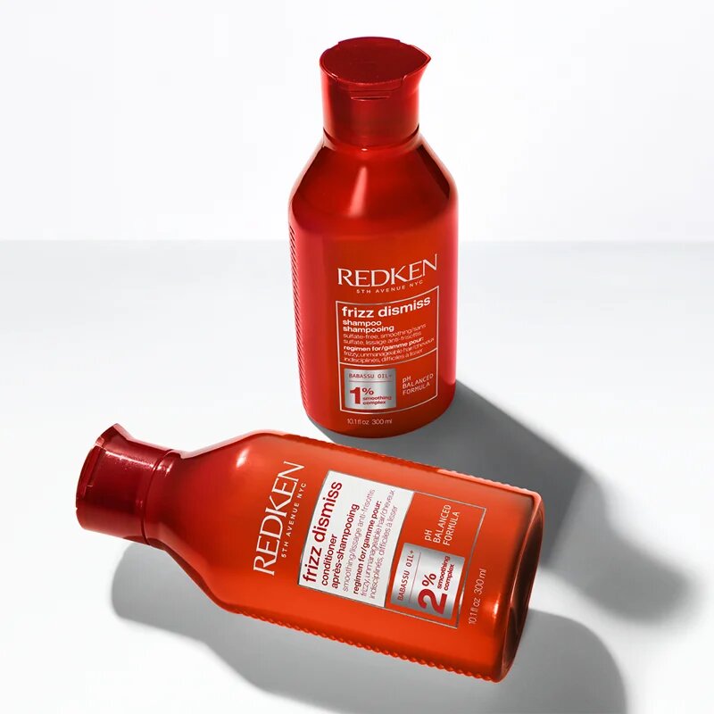 Redken Frizz Dismiss hranilni oljasti serum za neobvladljive lase 125 ml