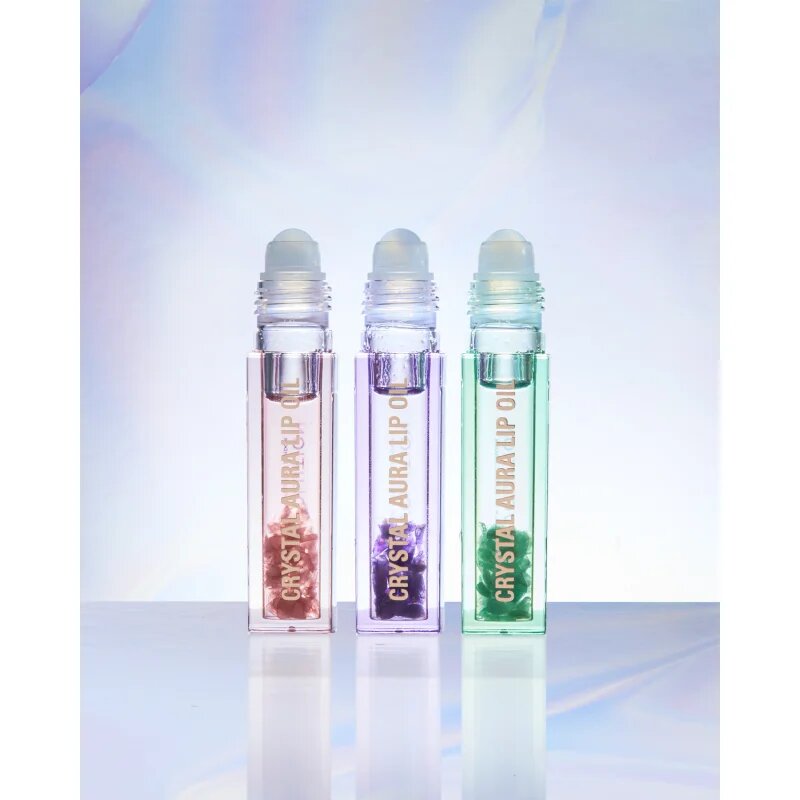 Revolution Crystal Aura olje za ustnice za prehrano in hidracijo odtenek Aventurine Cucumber 2.5 ml