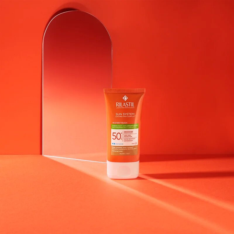Rilastil Sun System Water Touch zaščitna tonirana krema za obraz za mastno in mešano kožo SPF 50+ 50 ml