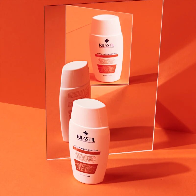 Rilastil Ultra 100-Protector vlažilni zaščitni fluid za občutljivo kožo SPF 50+ 50 ml