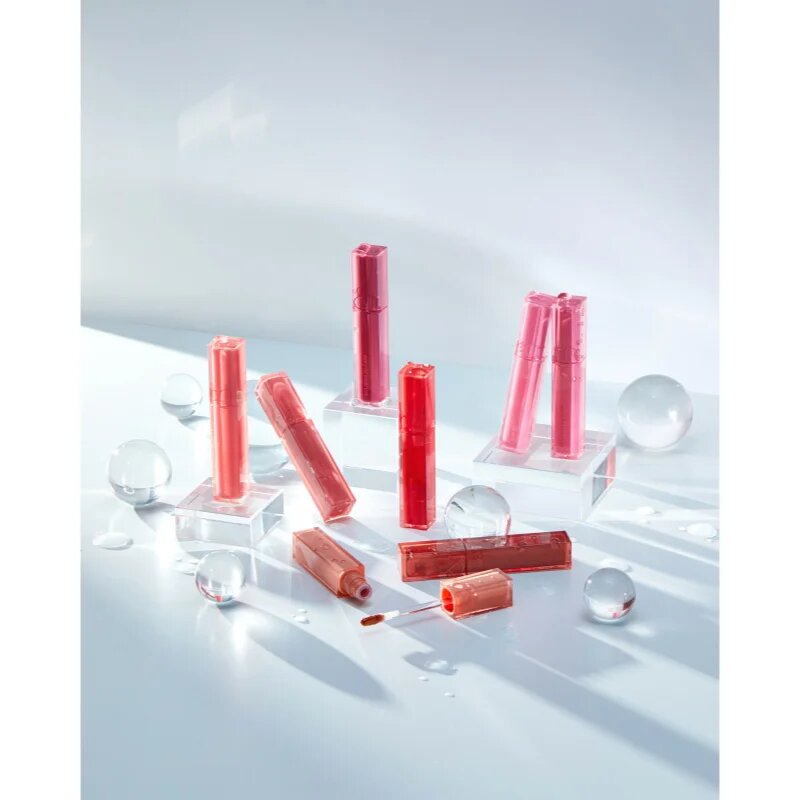 rom&nd Dewy Ful Water Tint dolgoobstojni sijaj za ustnice odtenek #01 In Coral 5 g