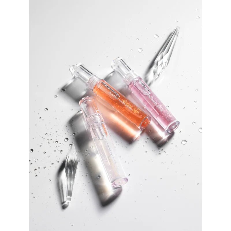 rom&nd Glasting Water Gloss svetleči sijaj za ustnice z bleščicami odtenek #01 Sanho Crush 4.3 g
