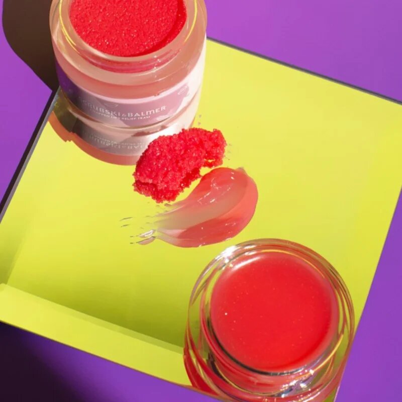 Rude Cosmetics Scrubski & Balmer balzam in piling za ustnice odtenek Grapefruit 7.5 g