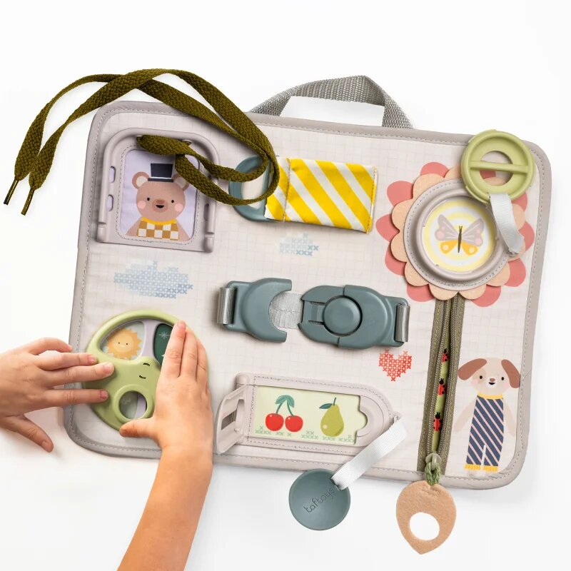 Taf Toys Snap‘n Learn Board igralni pano z aktivnostmi 18 m+ 1 kos