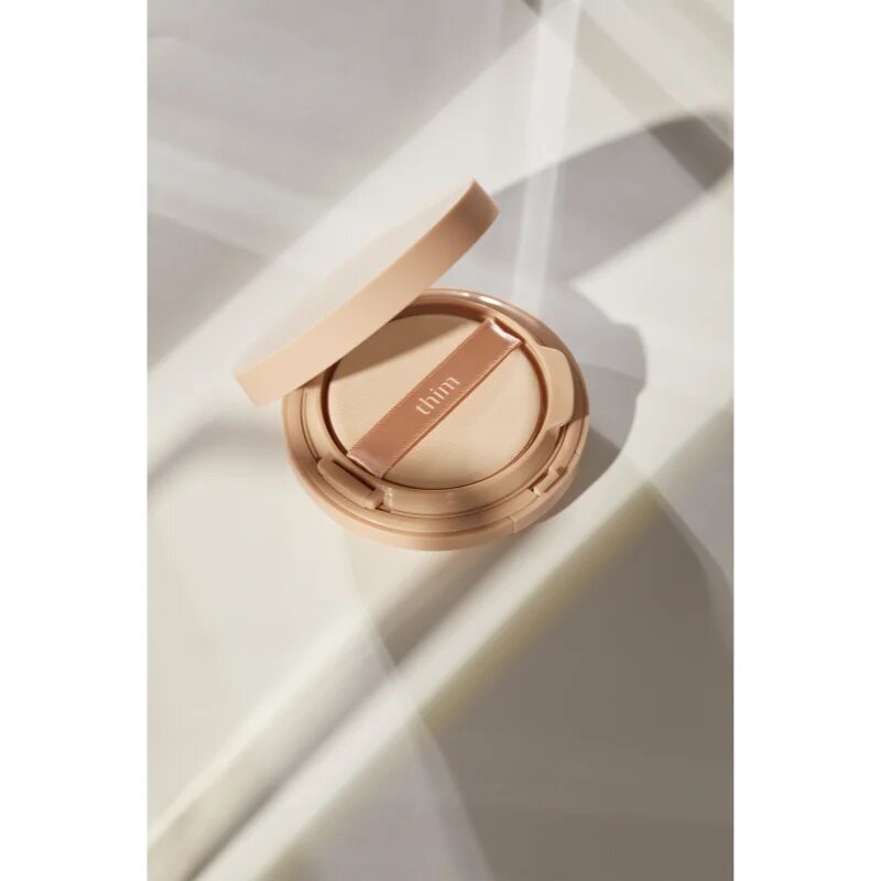 thim Luminous Skin Cushion dolgoobstojni tekoči puder v gobici za osvetljevanje kože in hidratacijo odtenek 19 Porcelain 15 g