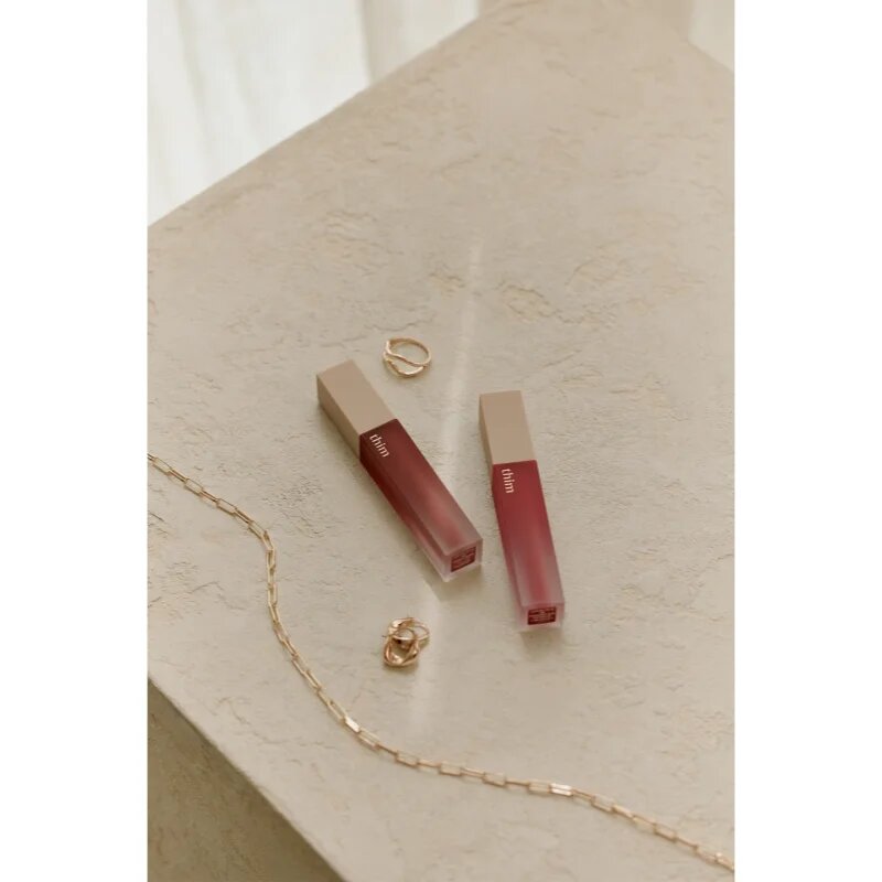 thim Sheer Matte Liquid Lip lahka tekoča mat šminka odtenek 06 Raspberry Bun 4 g