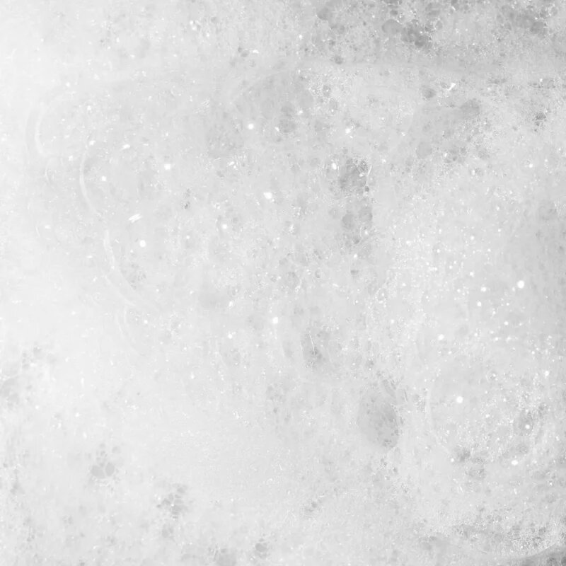Topicrem MELA Unifying Exfoliating Bar čistilno milo z učinkom eksfoliacije za obraz in telo 150 g