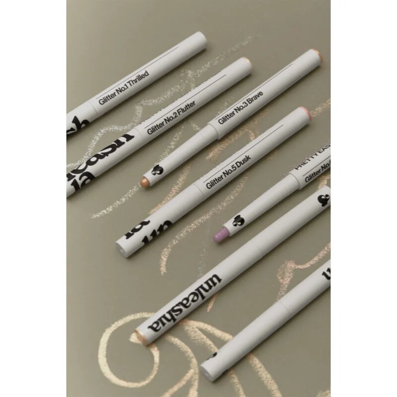 Unleashia Pretty Easy Glitter Stick kremasti osvetljevalec v paličici odtenek No.1 Thrilled 0.7 g
