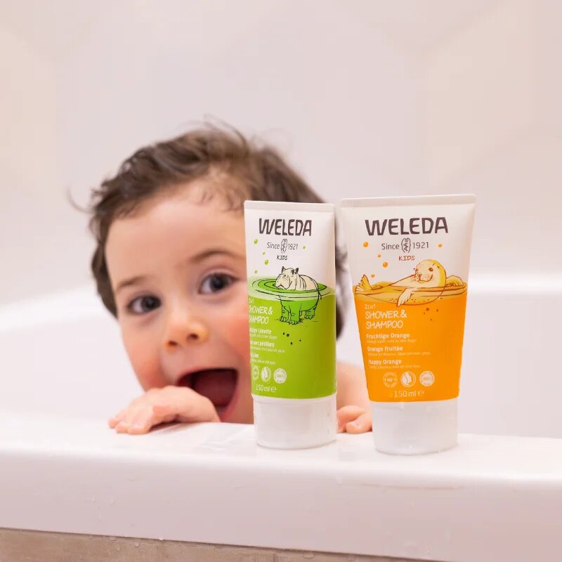 Weleda Kids Happy Orange krema za prhanje in šampon za otroke 2 v 1 150 ml