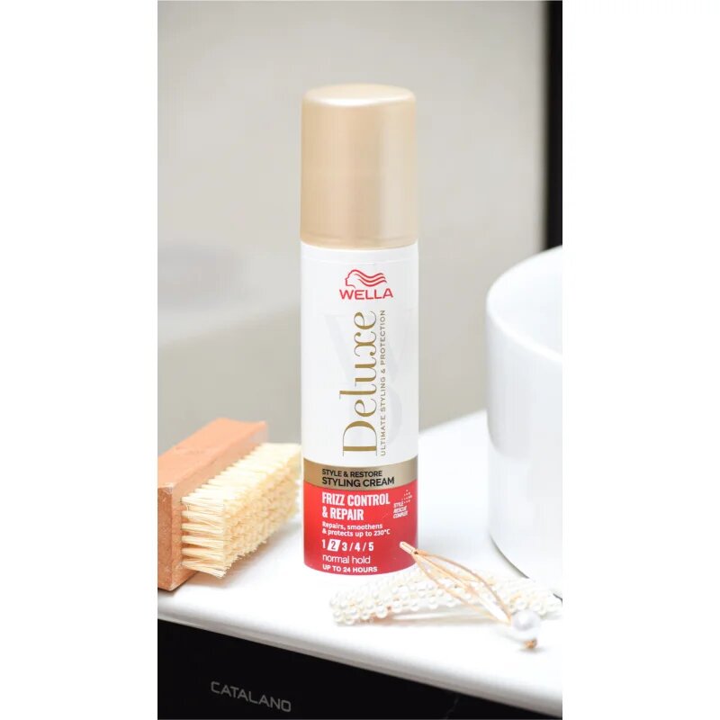 Wella Deluxe Style & Restore stiling krema za glajenje in obnovo poškodovanih las 100 ml