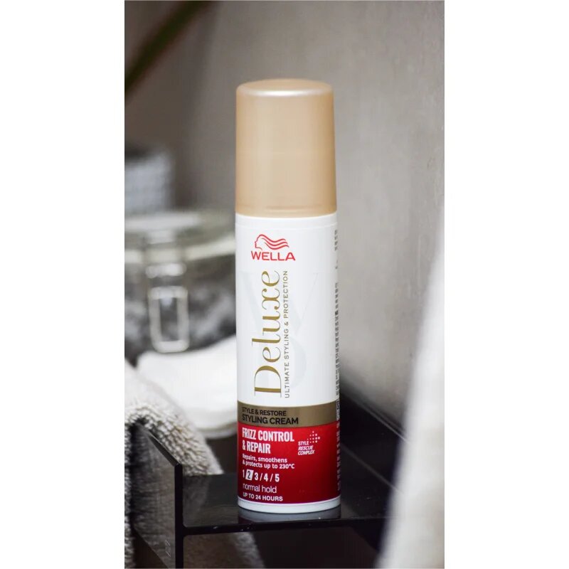 Wella Deluxe Style & Restore stiling krema za glajenje in obnovo poškodovanih las 100 ml